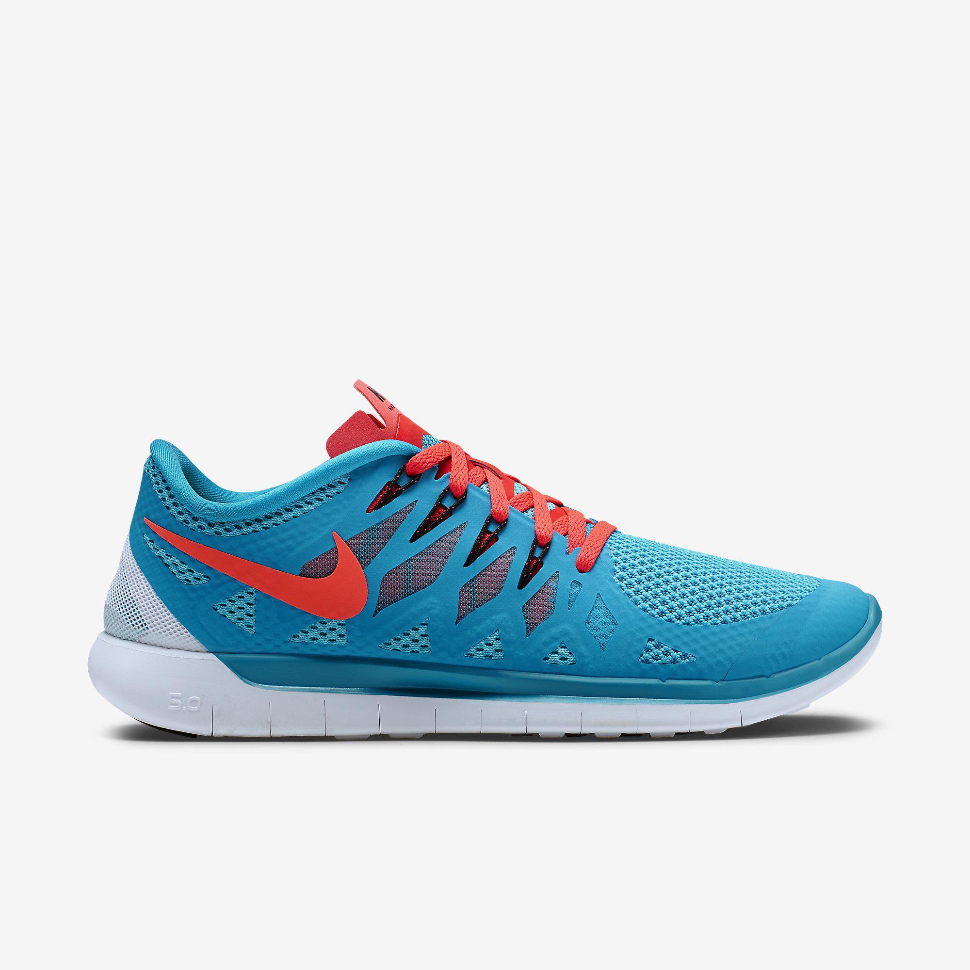Bright blue nike trainers