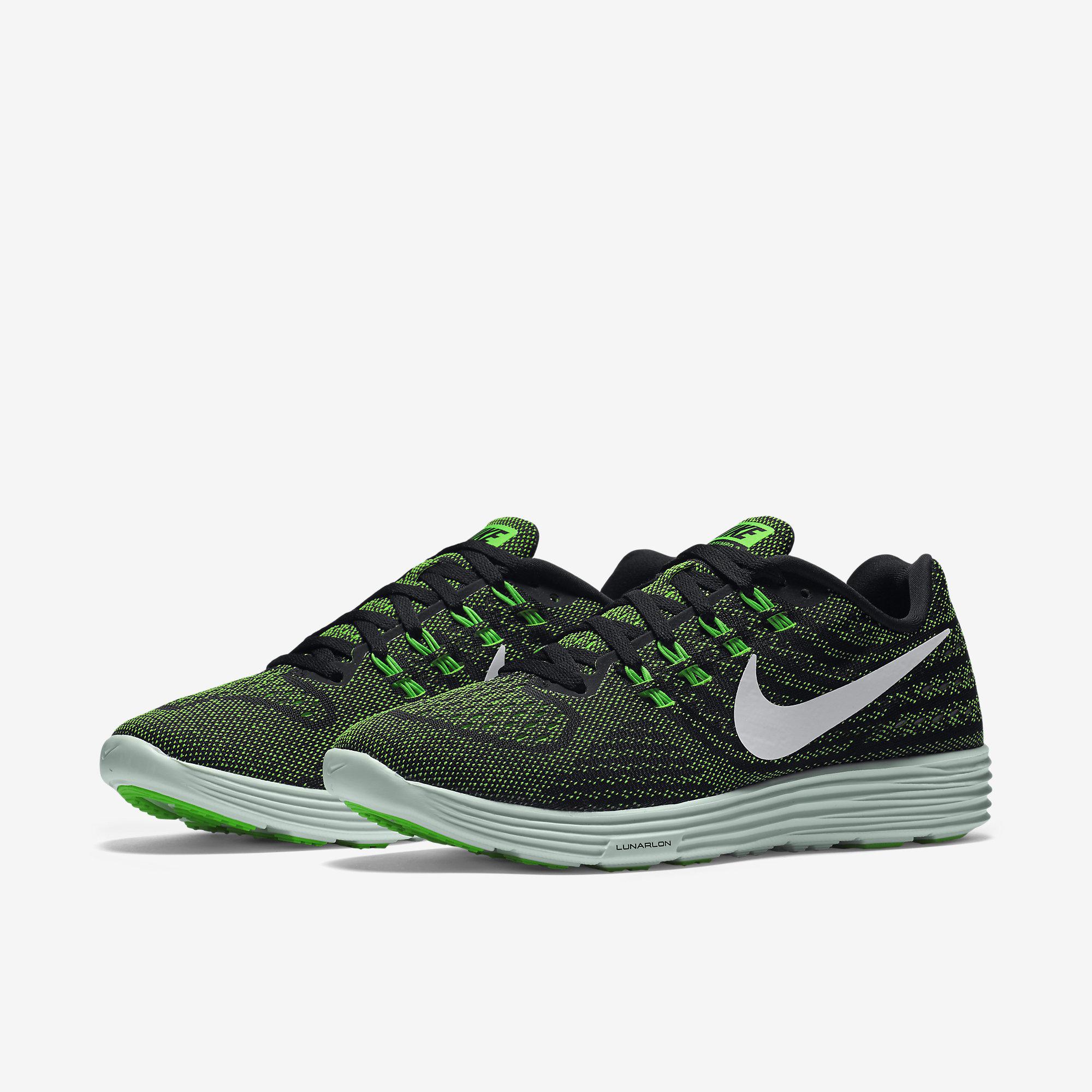 green nike athletic shoes