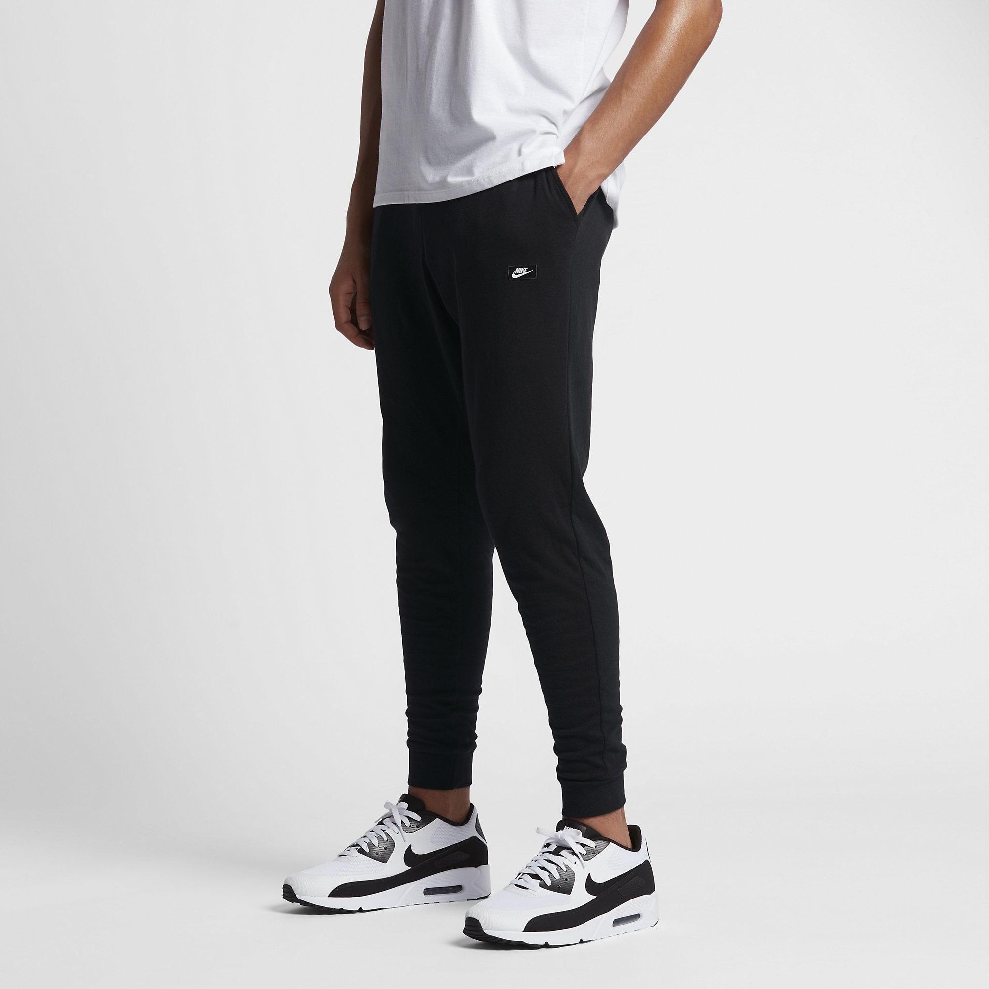 nike modern tracksuit black