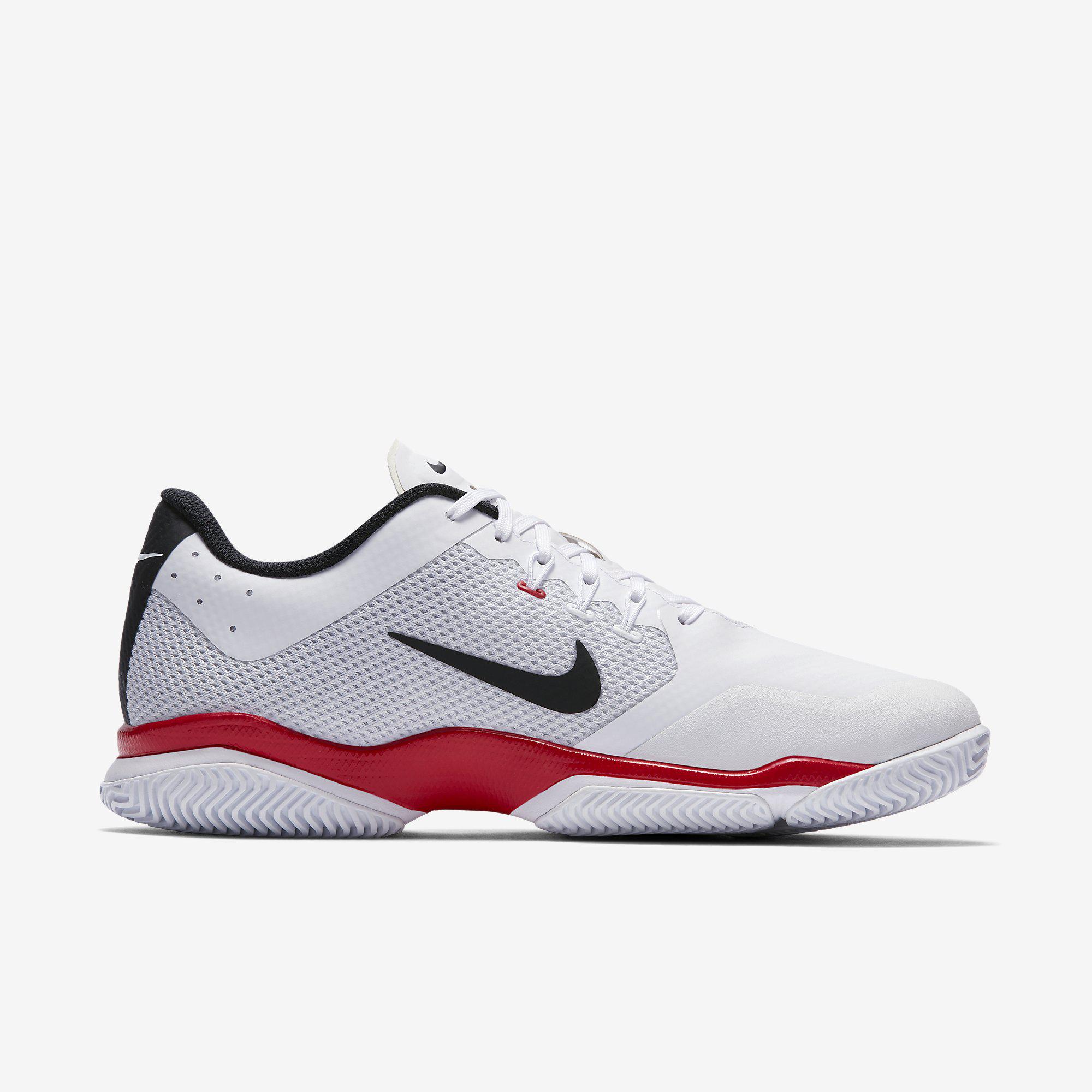 nike red and white tennis shoes