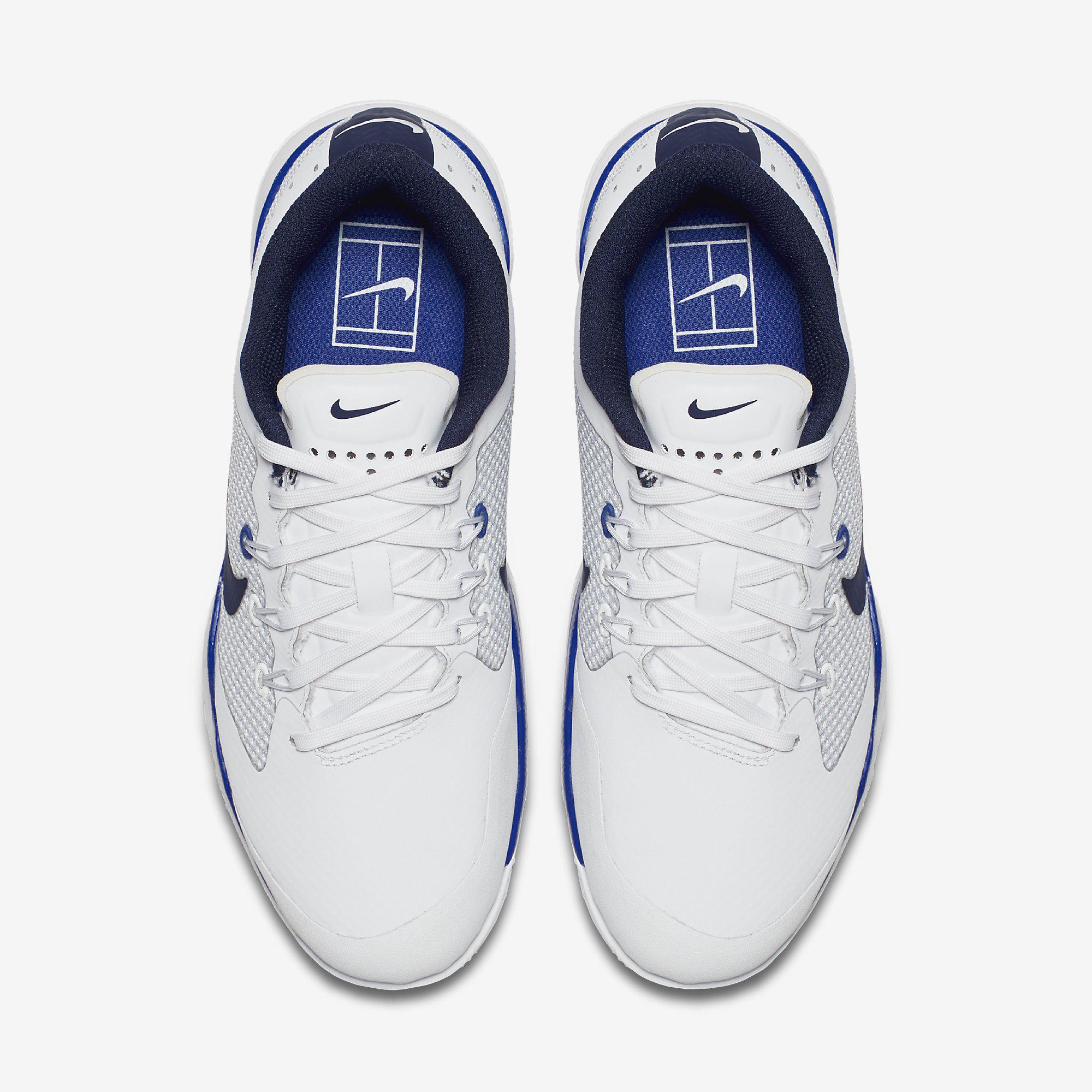 blue and white nike tennis shoes