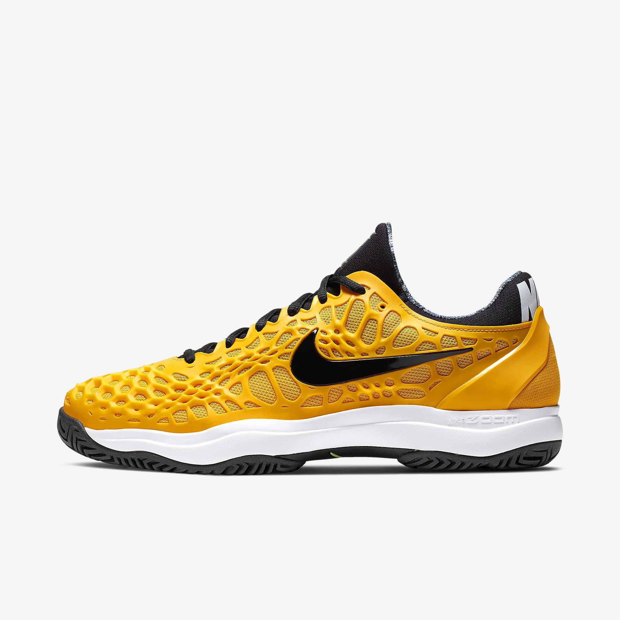 gold nike tennis shoes