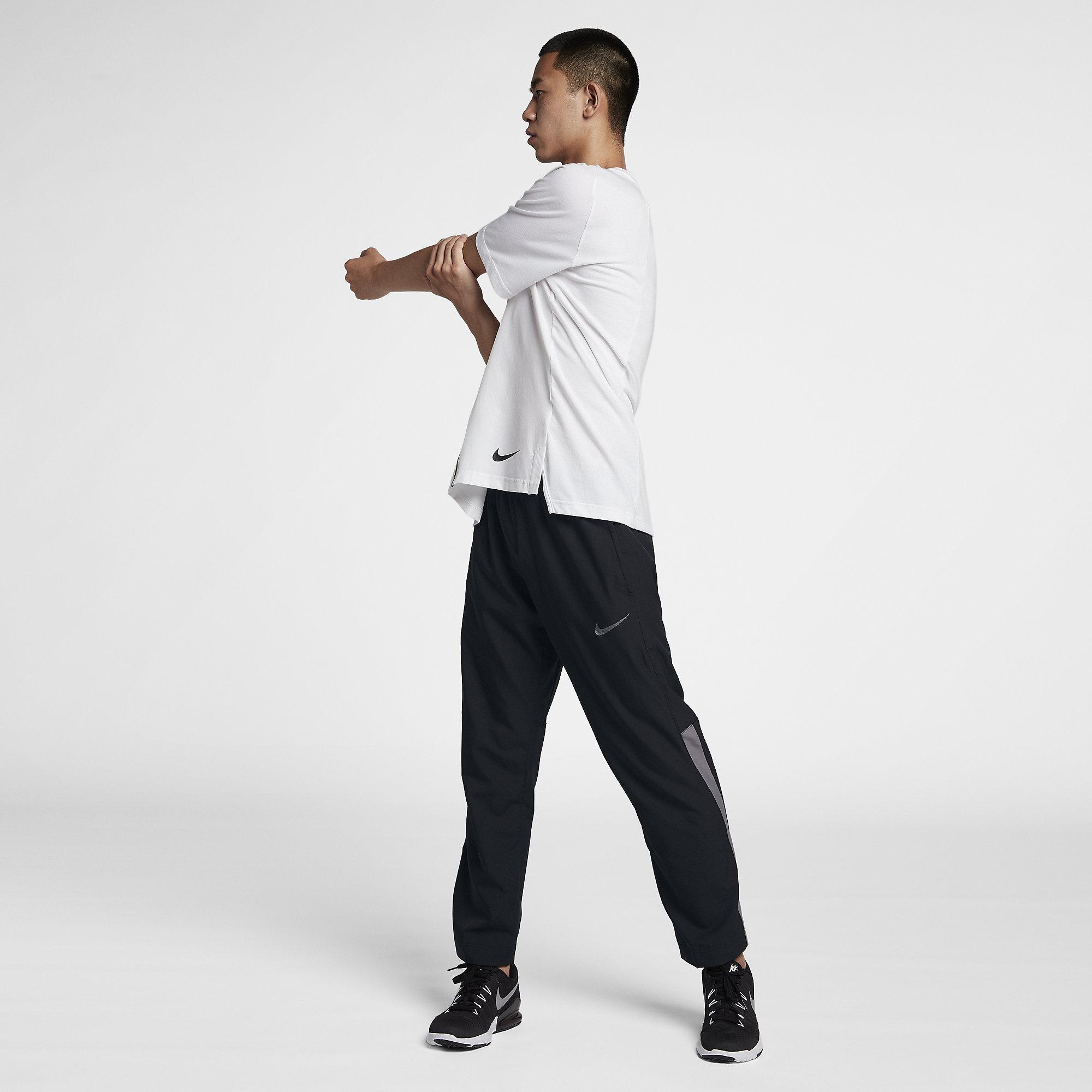 nike dri fit woven pants mens
