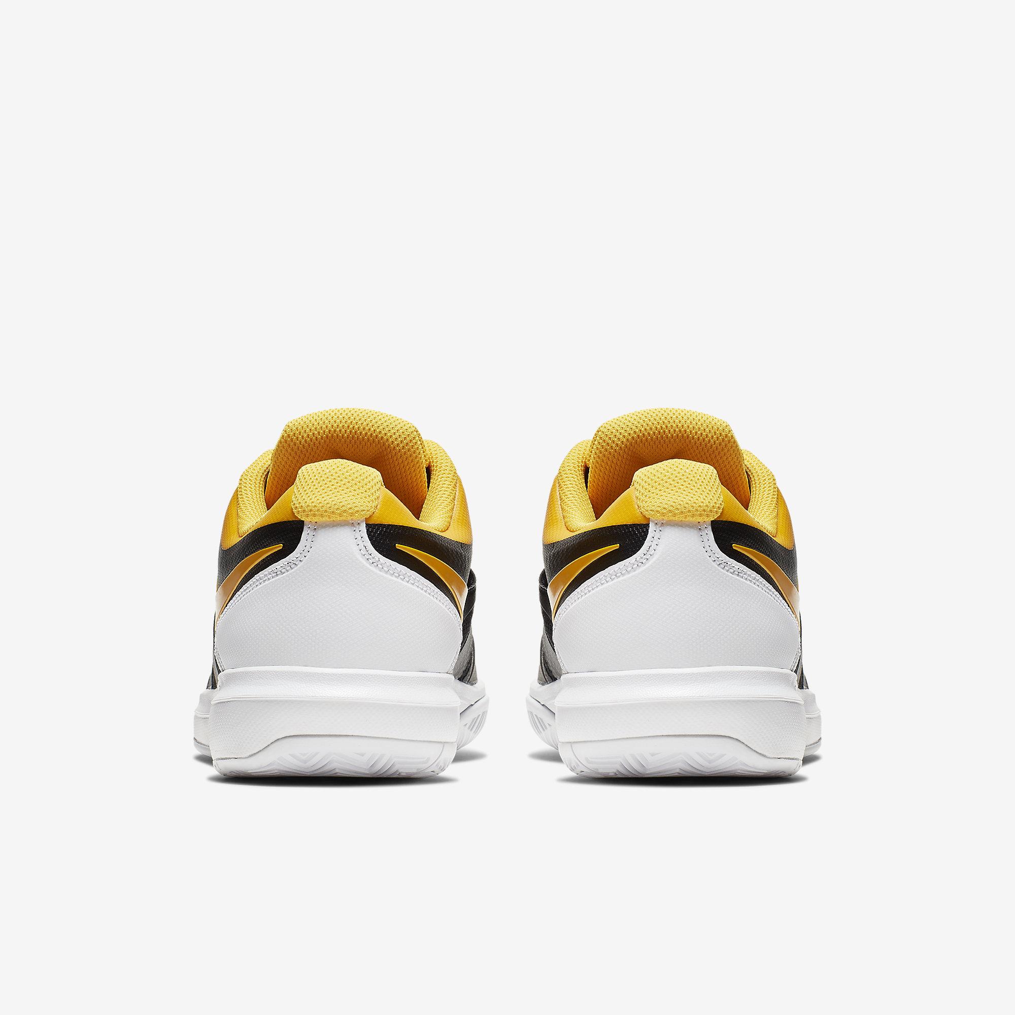 nike white and gold tennis shoes