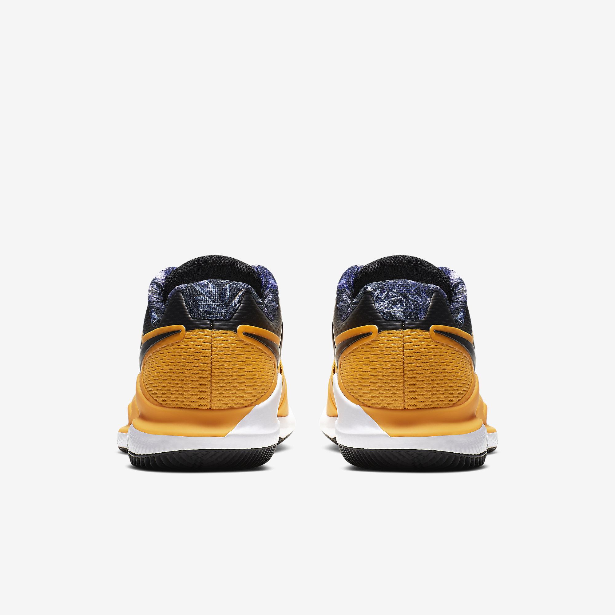 nike tennis shoes gold
