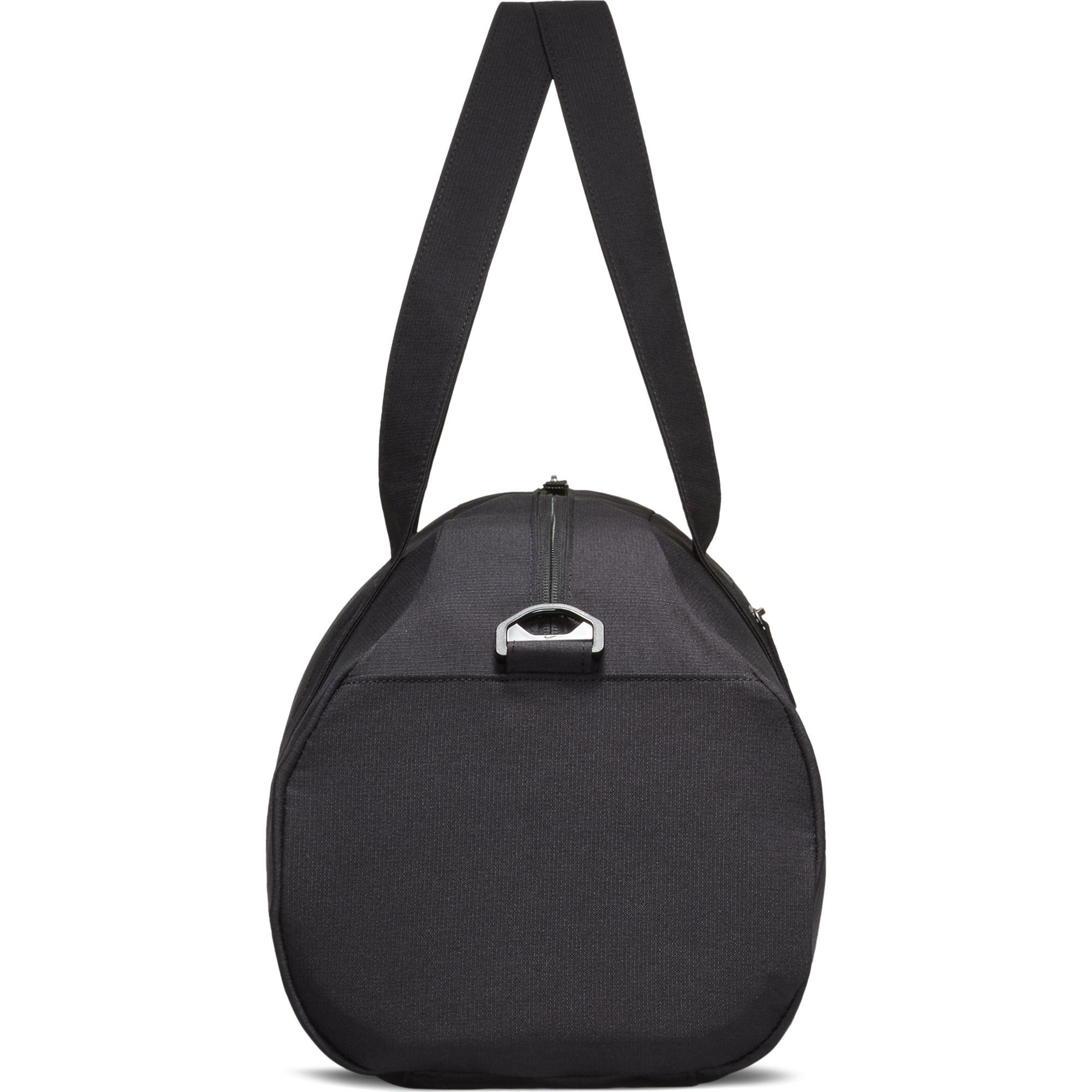 black and gold nike duffel bag
