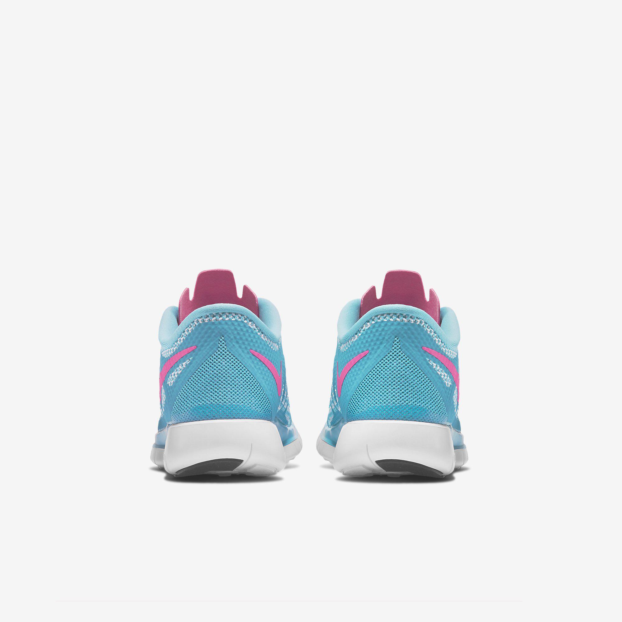 pink and blue nike tennis shoes