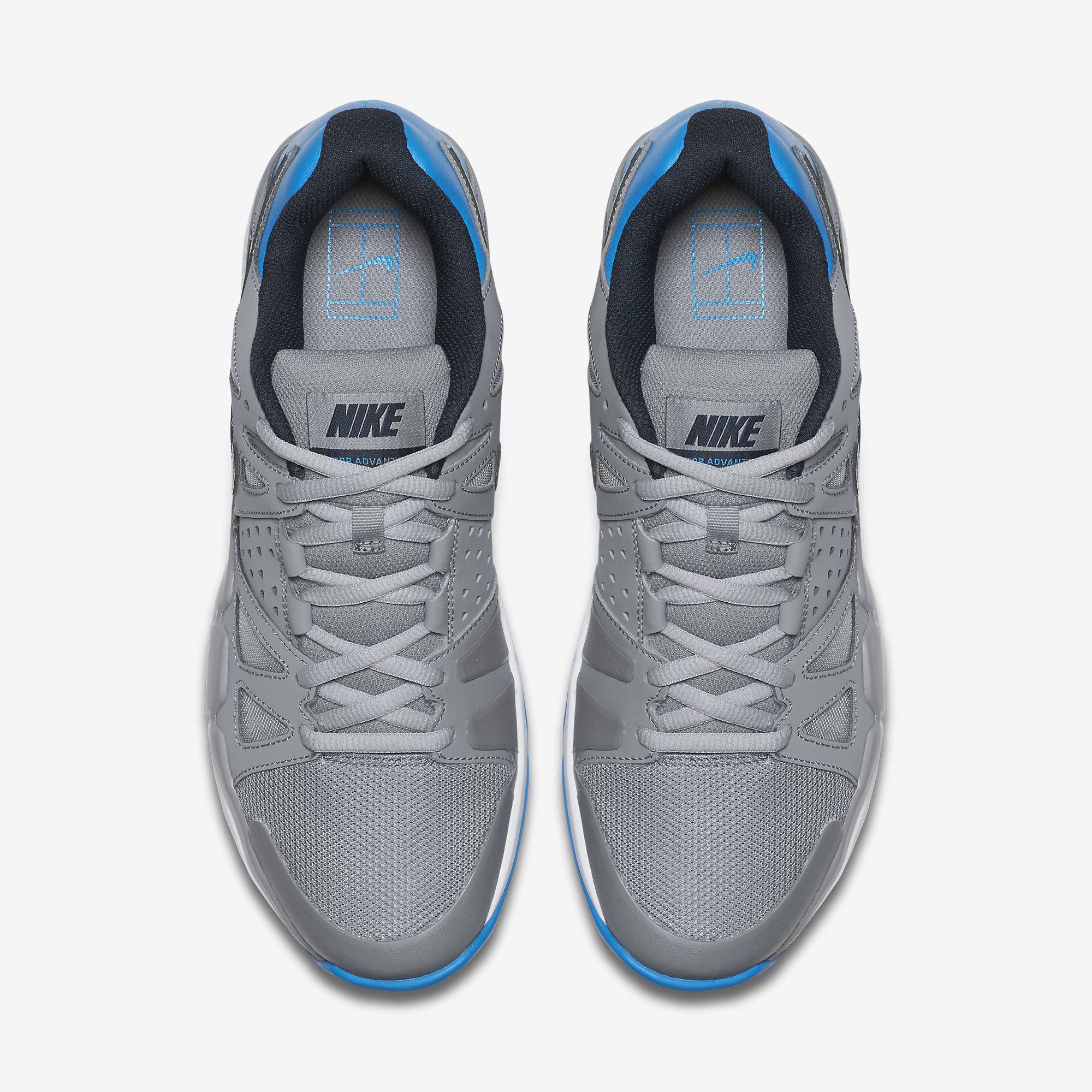 white and grey nike tennis shoes