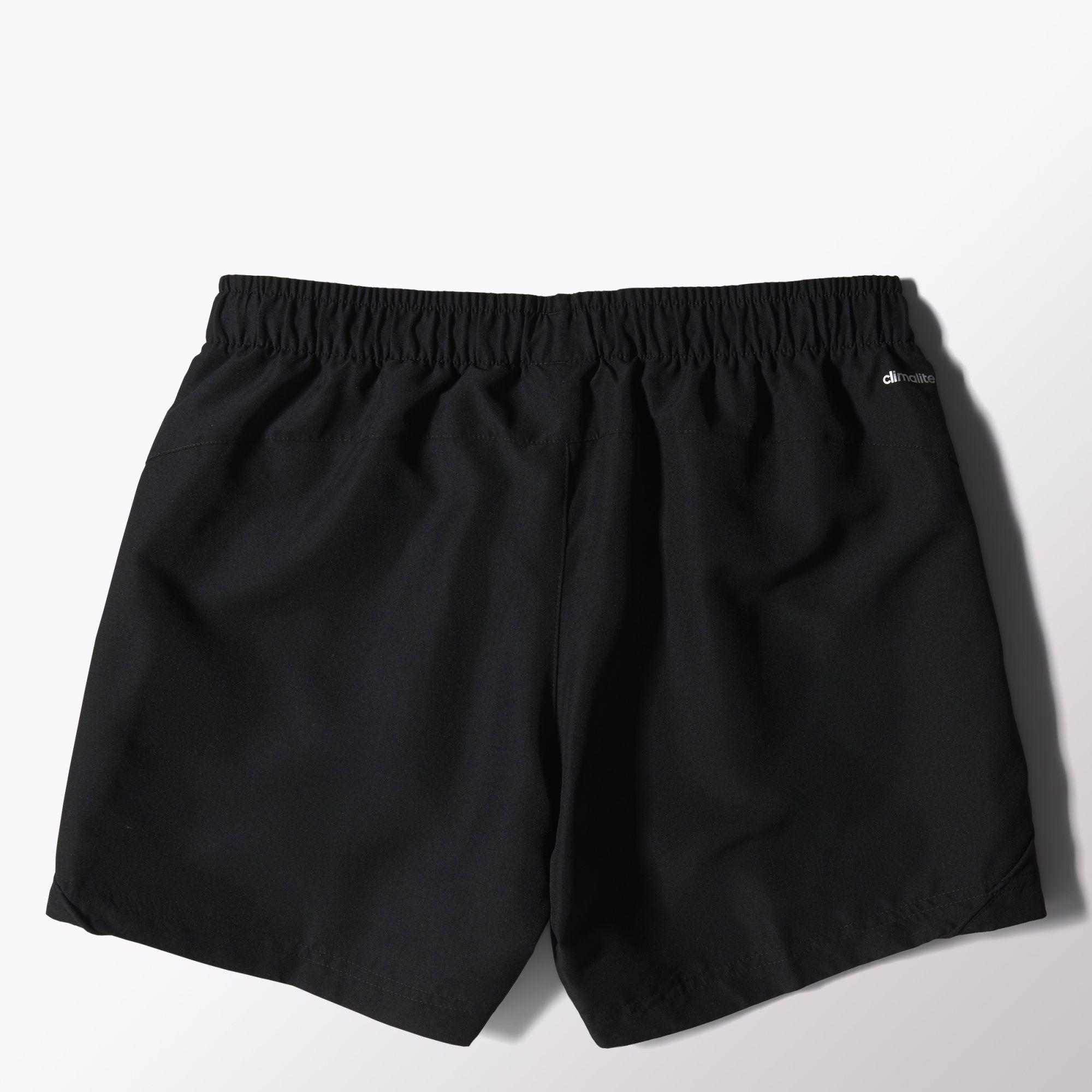 white shorts black shoes
