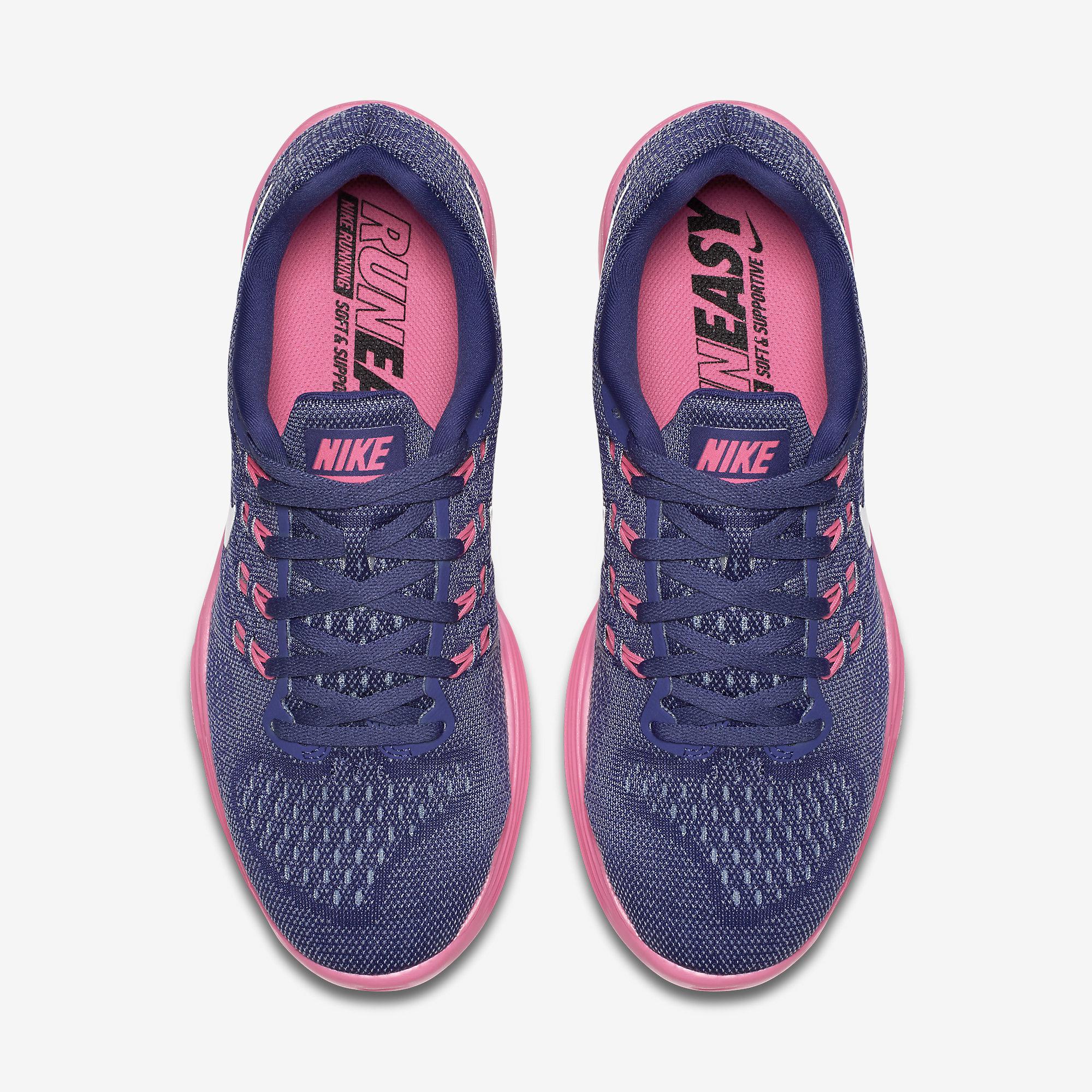 purple nike track shoes